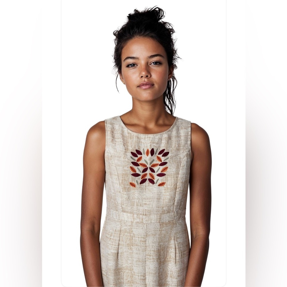 New-XL Sleeveless Beige Jumpsuit with Embroidered Leaves Detail
2026 Season